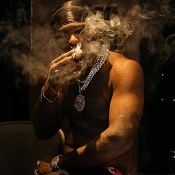 Man relaxing at home enjoying a calm cannabis experience